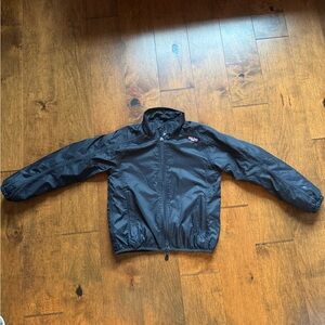 Black fleece lined Windbreaker Jacket used for everyday wear or equestrian rider